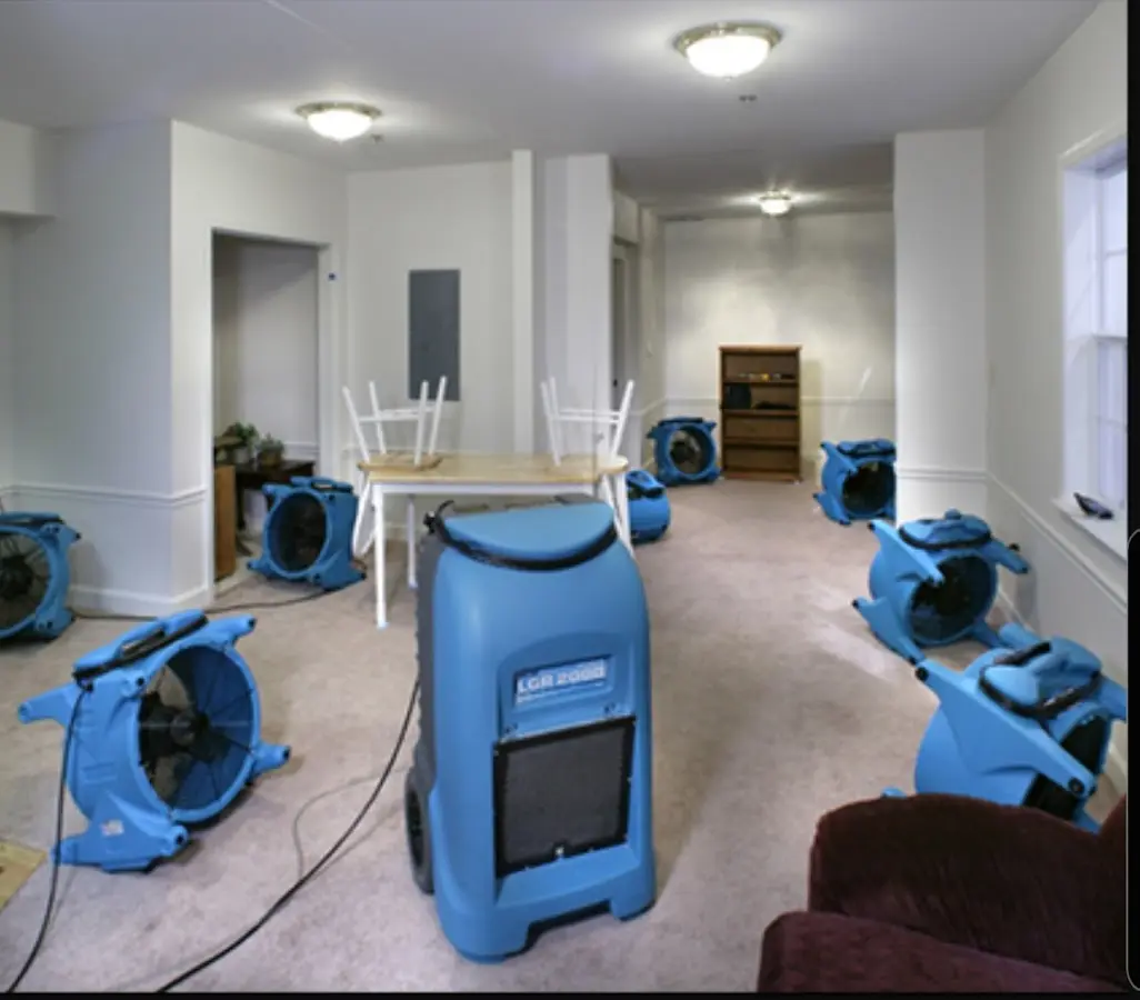 Air movers and dehumidifier setup for Water Damage Restoration in Adams